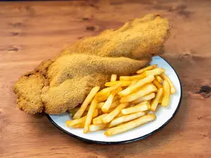 Milanesa de carne con guarnición