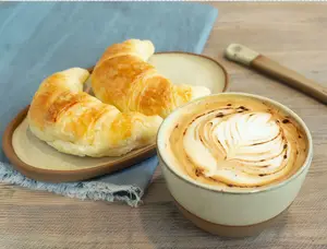 Café grande 12 oz + 2 Medialunas