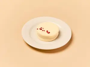 Alfajor choco blanco y framb.