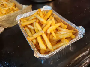Papas fritas con ketchup thai