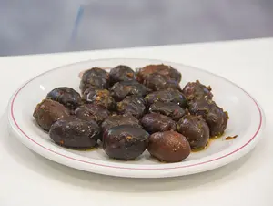 Aceitunas negras condimentadas