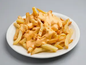 Papas fritas con cheddar