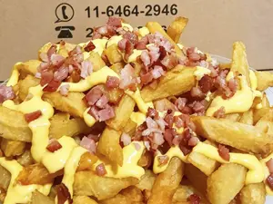 Porde fritas cheddar y bacon