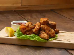 Chicken fingers con papas