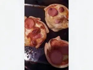 Empanada de salchicha y papas