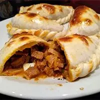 Docena de empanadas horneados