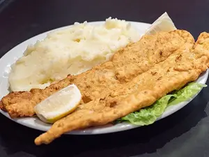 Filete a la romana con guarnic