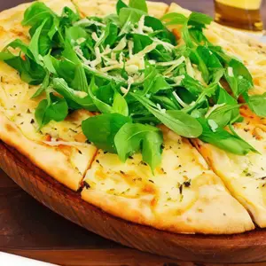 Pizza con rúcula