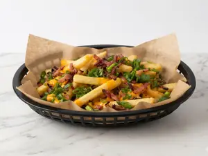 Papas con cheddar y bacon