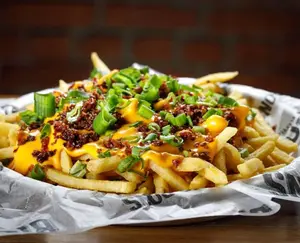 Papas fritas con cheddar bacon