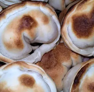 Empanada De Jamón Y Muzzarella