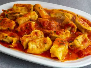 Ravioles de osobuco con pomodoro