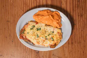 Milanesa napolitana con puré de boniato