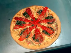 Pizza fugazzeta con morrón