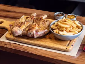 Pollo entero a las brasas