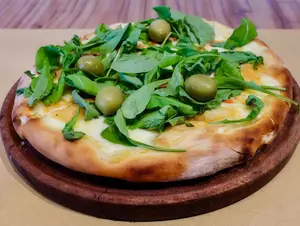 Pizza con rúcula