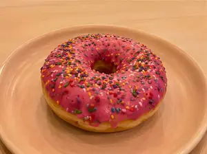 Dona rellena de dulce de leche