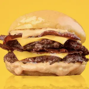 Capretta burger con papas