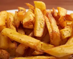 Papas fritas con cheddar