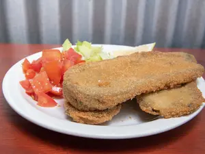 Berenjena napo con guarnición