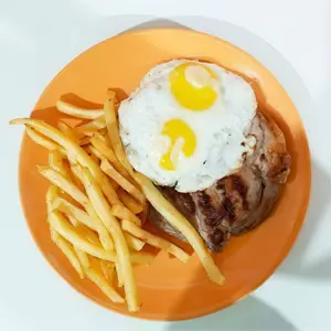 Bife de chorizo a caballo