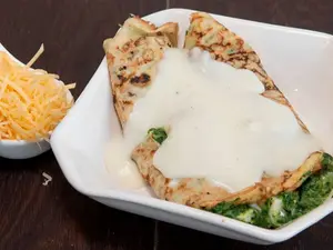 Canelones con boloñesa