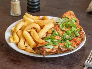 Milanesa capresse guarnición