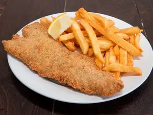 Milanesa de ternera con guarnición