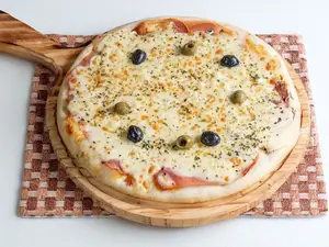 Ravioles crema al champiñones