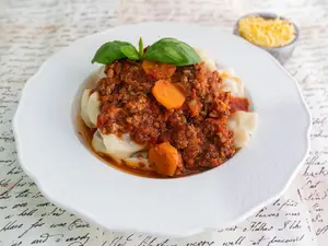 Sorrentinos con salsa boloñesa
