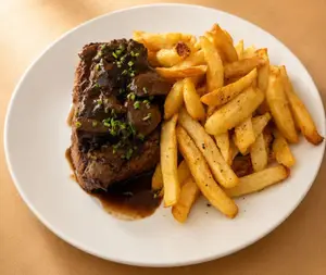 Bife de Chorizo 3 hongos + Papas fritas