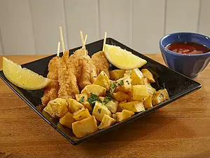 Pinchos pollo con fritas