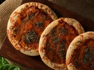 Pizzeta de muzzarella y jamón