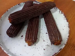 1/2 doc churros relleno bañado