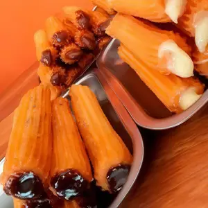 1/2 docena churros rellenos