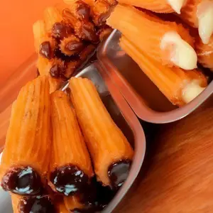 1 docena churros rellenos
