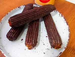 Churro relleno bañado