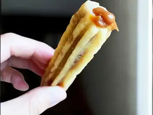 Churro con dulce de leche
