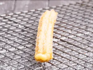 1 churro relleno pastelera