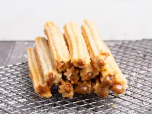12 churros relleno de dulce l