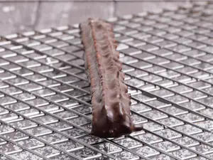Churro bañado relleno con ddl