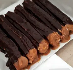 6 churro relleno con ddly baño de chocolate