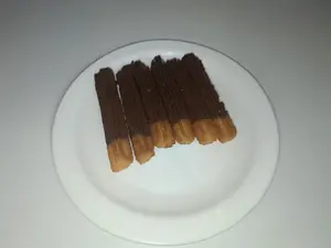 6 Churros Bañados De Chocolate