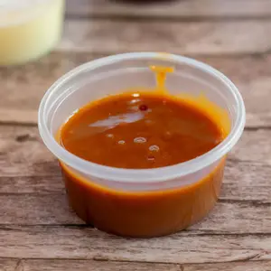 Porción de salsa de dulce de leche