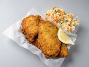 Mila de pollo con guarnición