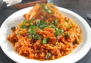 POLLO AL DISCO CON ARROZ