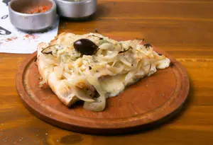 Pizza chica fugazzeta la casa