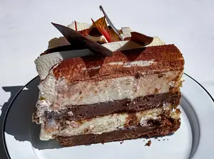 Porción brownie tiramisú