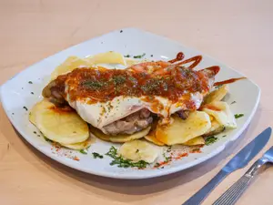 Matambrito de cerdo a la pizza