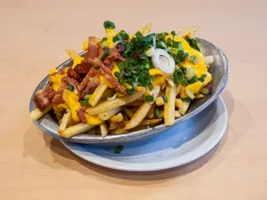 Porción de papas Delva